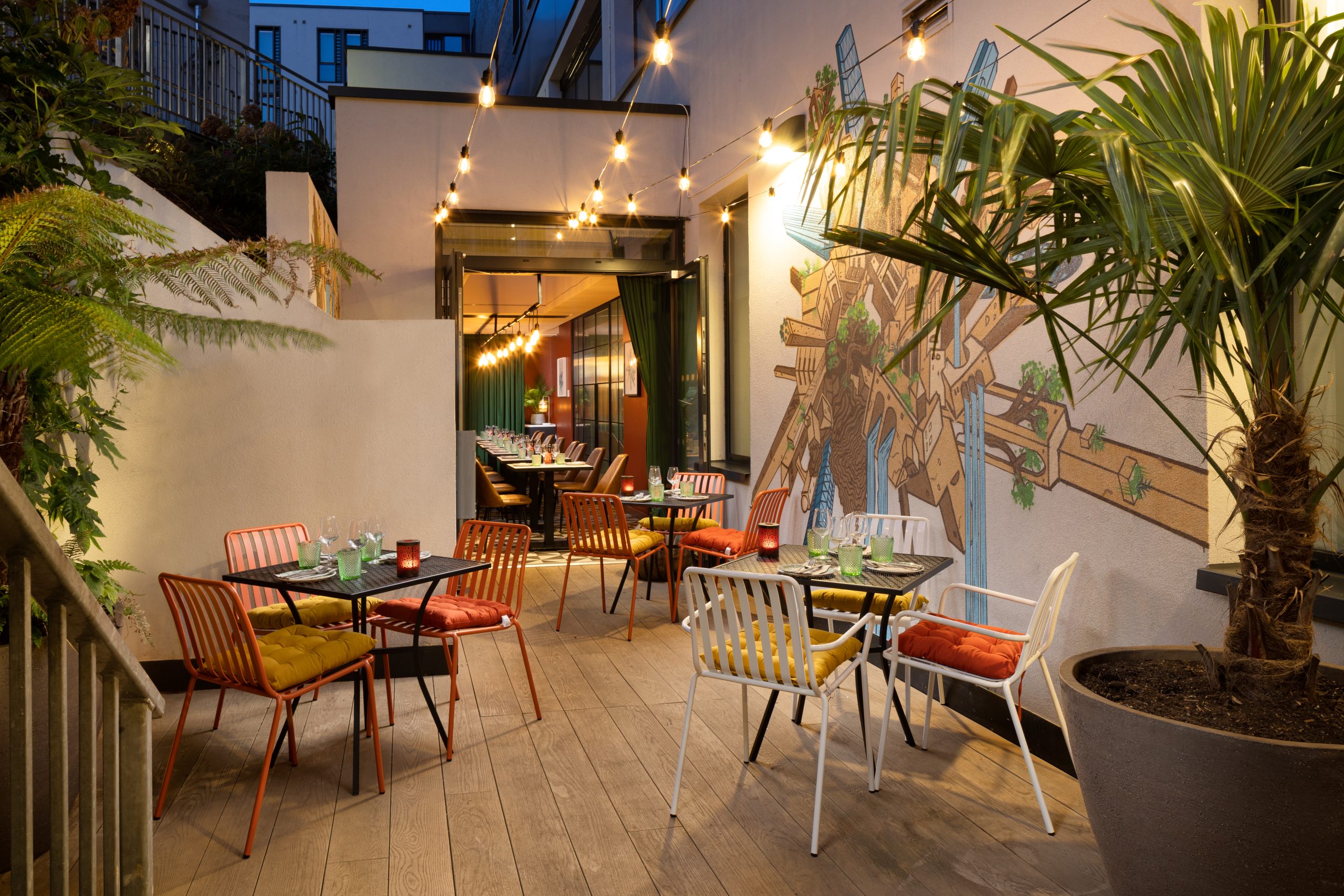 Courtyard with table and chairs.