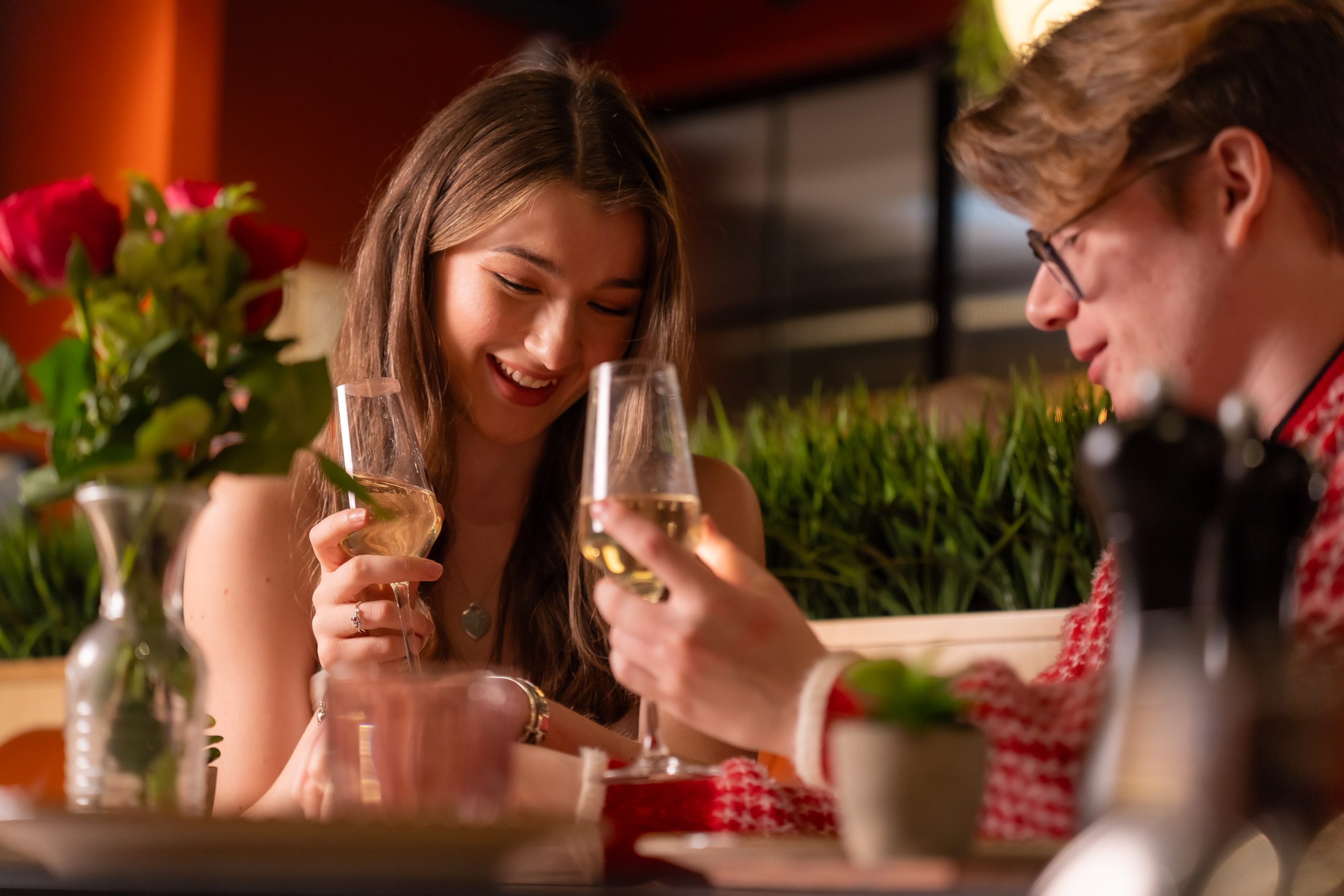 couple at restaurant with prosecco